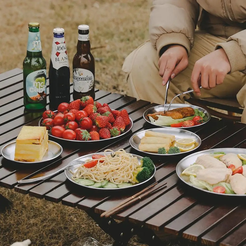 Outdoor dining with stainless steel plates — serving suggestion